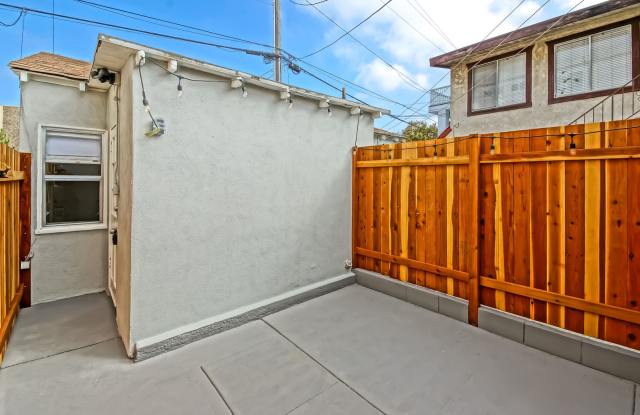 Prime Downtown MB Studio Guesthouse! Bright & Charming Detached Guesthouse w/ Large Private Fenced Patio Space & 1-Car Off-Street Parking in the Heart of Downtown MB! Gallery 1