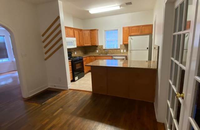 UT PRE-LEASE: Charming home 2 blocks from UT, Wood Floors, Updated kitchen, Walk/Bike to Campus Gallery 3