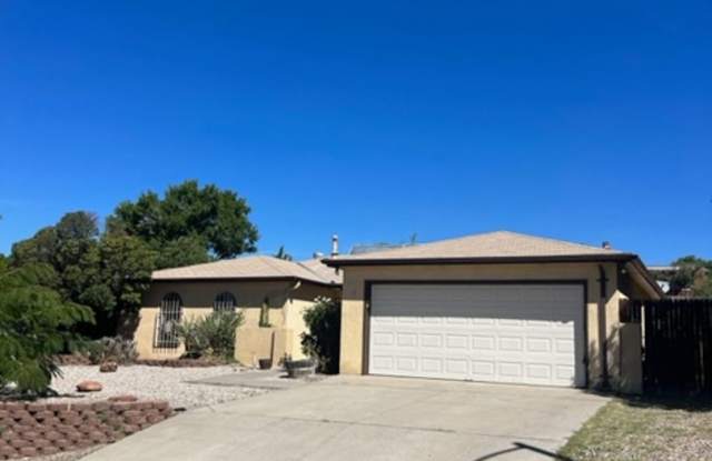 Beautiful 3 Bed 2 Bath 2 Car Garage just East of Tramway and Indian School! photos photos