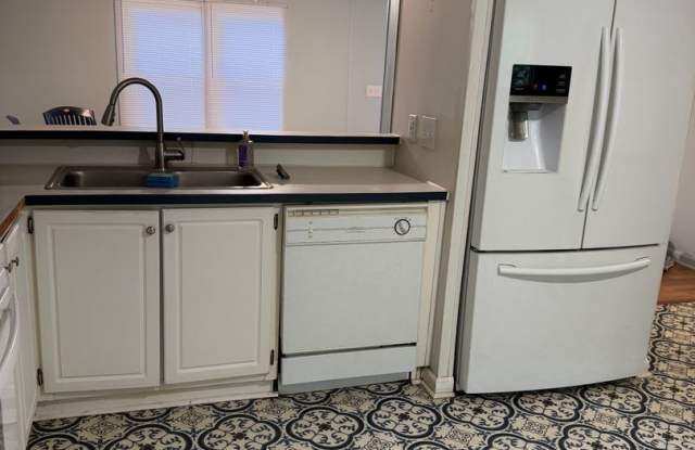 Enjoy peaceful country living in this 3-bedroom, 2-bathroom manufactured home located in a quiet neighborhood. photos photos