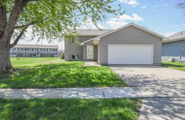 Updated 3BR Split-Level Home with Huge Deck, Fenced Yard & 2-Car Garage Near I-29! photos photos