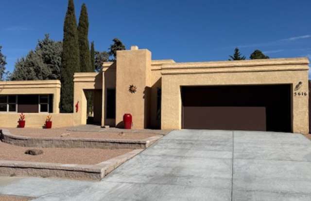 Beautiful NE Heights Neighborhood Executive style home with a Large back yard that has a full size pool. photos photos