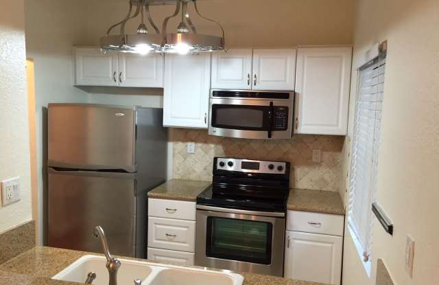 Beautiful 1 Bed/1 Bath Condo Apartment with Patio, Hardwood Flooring, Central AC, Washer and Dryer hookups, and Granite Countertops - 7632 Topanga Canyon Boulevard, Los Angeles, CA 91304