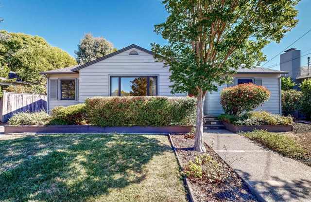 Bright & Cozy!  Conveniently located Three Bedroom Two Bath Single Level with Detached Two Car Garage! Gallery 3