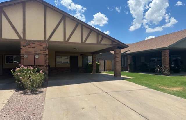 Single-Level 2 Bedroom/2 Bath Twin Home with 2-Car Carport  Yard. photos photos