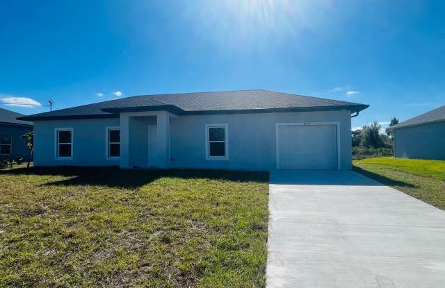 BRAND NEW 3/2/1 SINGLE FAMILY HOME--SW LEHIGH ACRES photos photos