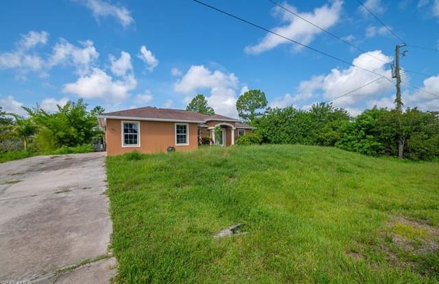 1911 Woodrow AVE - 1911 Woodrow Avenue, Lehigh Acres, FL 33972