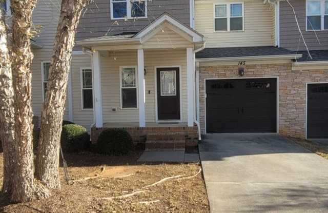 Spacious Three-Level Townhome with Finished Basement in Convenient Garner Location photos photos