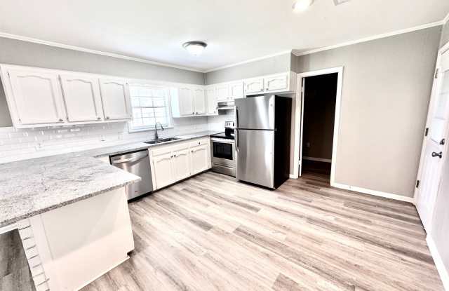 Bright & Spacious 3 Bedroom Brick Home with Double Carport & Large Backyard Gallery 4