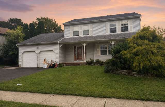 Bright 3-Bedroom Howell Home with Fireplace, Deck & Garage Gallery 1