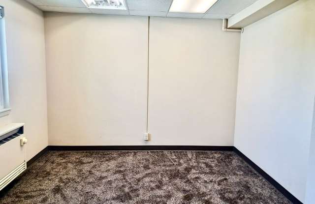 UNDER NEW MANAGEMENT: Spacious 1BR Efficiency w/ Tons of Storage! All-Inclusive "One Bill" Living, Free Wi-Fi & Laundry! Gallery 3