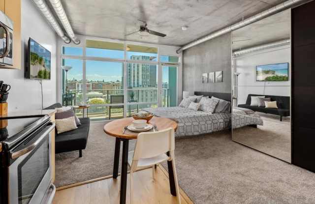 Stylish East Village Studio | Rooftop Amenities | Flexible Lease Options photos photos