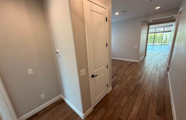 Stunning Luxury 4-Bedroom Home | 2,600+ Sq Ft | Modern Finishes & Private Turf Backyard Gallery 3