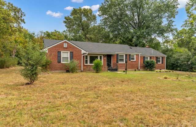 Renovated 4 Bed/ 2 Bath plus office in Madison, Large Kitchen, Living Room and Den, Hardwoods, Tile, Carport photos photos