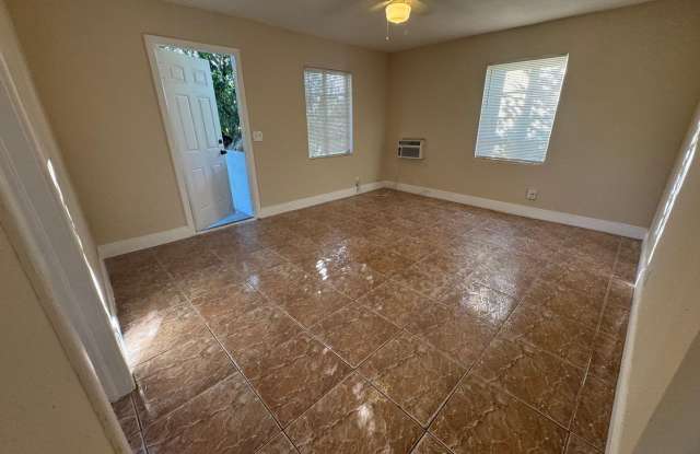2 Bedroom 1 Bath 2nd floor unit WATER INCLUDED, Lake Worth Beach. NO HOA - 905 North J Street, Lake Worth, FL 33460