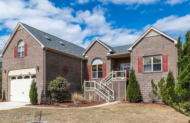 Waterfront Stunner! 3X3 in Gated Marina Community! Gallery 1