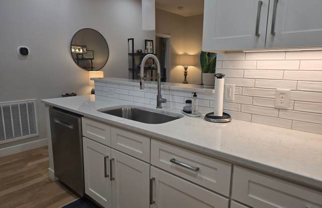 Sleek First-Floor Condo with Park-View Patio & High-End Finishes Gallery 3