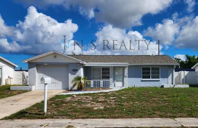 Just Reduced!!  BEAUTIFUL 2/2/1 1000 Sq. Ft. with a large open floorplan, fenced yard and an enclosed lanai!! photos photos