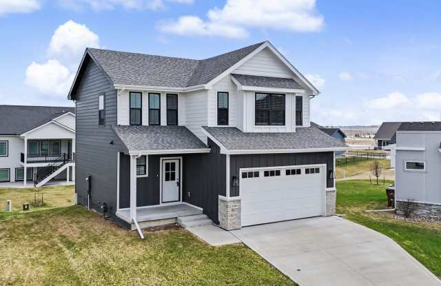 Spacious 4-Bedroom Home with 2-Car Garage & Yard photos photos