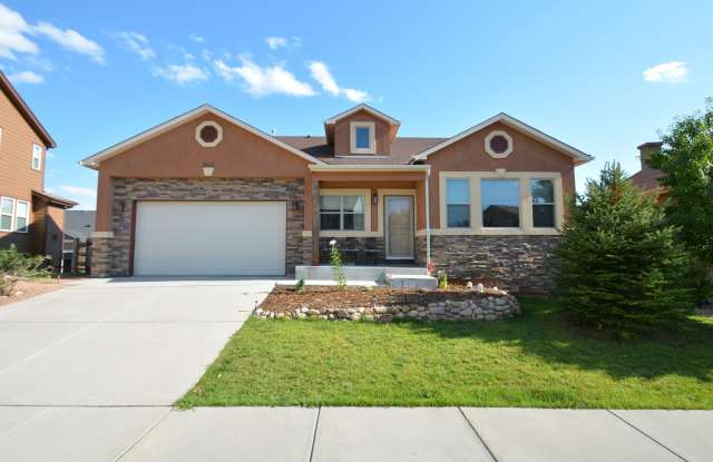 Beautiful ranch style home available to move in on 08/05/2024! - 943 Spectrum Loop, Colorado Springs, CO 80921