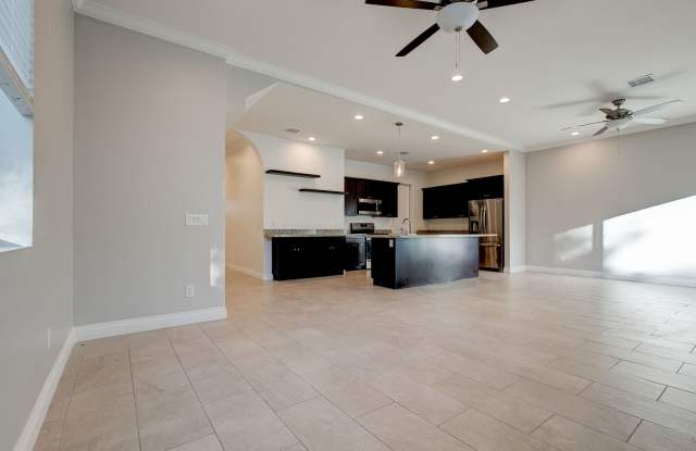 Like new 4 bedroom, 2.5 bathroom, plus a den, 2 car garage. Upgraded Kitchen and Appliances. Washer and Dryer Included!!! Available now!!! photos photos