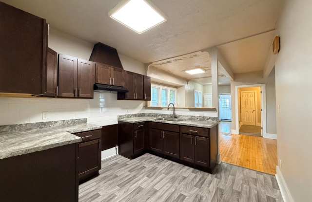 Renovated Open Concept 5BR/2BA Rent to Own Home with Garage Gallery 4