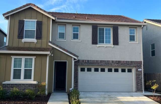 Spacious 4 Bedroom Home with Downstairs Bedroom and Upstairs Loft in Whitney Ranch Rocklin photos photos