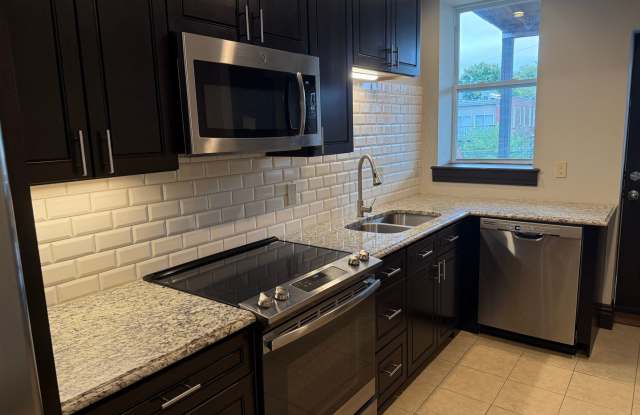 Modern Luxury Meets Historic Charm: Tour This Upscale 2-Bed Retreat Steps From The Grove This Sunday! Gallery 1