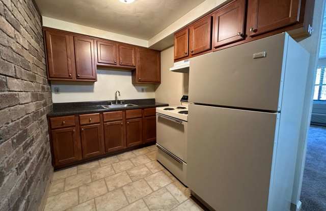 One Bedroom Apartment with Exposed Brick & Off-Street Parking! Tour this Stunning One Bedroom Today! photos photos
