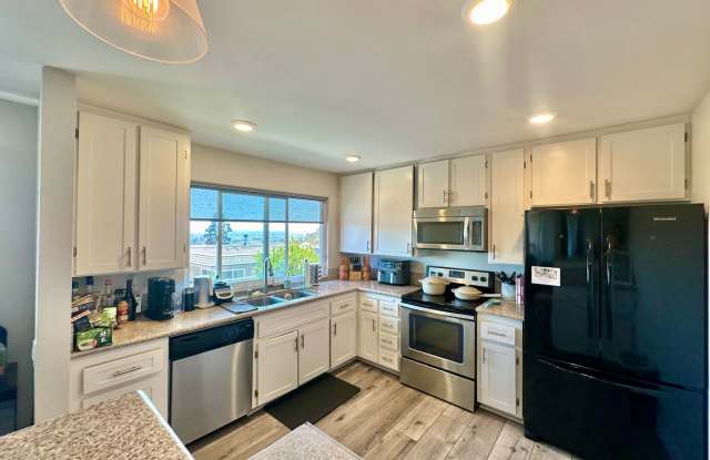 3 Bedroom Townhome near USD!! Parking + Laundry Included!! photos photos