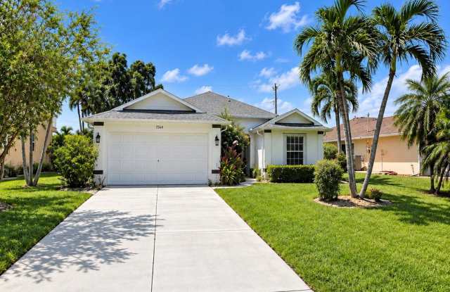 Beautiful 3-Bedroom SW Cape Coral Home – Screened Lanai, 2-Car Garage & Tropical Yard! photos photos