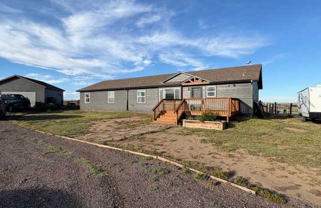 Welcome to your 3.85 acre homestead/country 4 bedroom, 3 bathoom home! photos photos