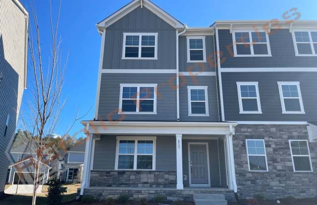 Rental Resort Living! Gorgeous End Unit 3 Story 4 bedroom, 3.5 bathroom Bradley Townhome With Many Windows Featuring a 1st floor Guest Suite, 2 Car Garage, and High Speed Internet Included! Located in Stoneriver, Knightdale, Available Apr 4th! photos photos