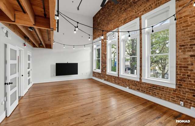 Huge Lofted Condo Overlooking Main Street Gallery 1