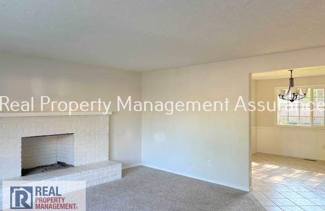 Comfortable 4BD Aloha Home with AC, Fireplace & 2-Car Garage Gallery 4