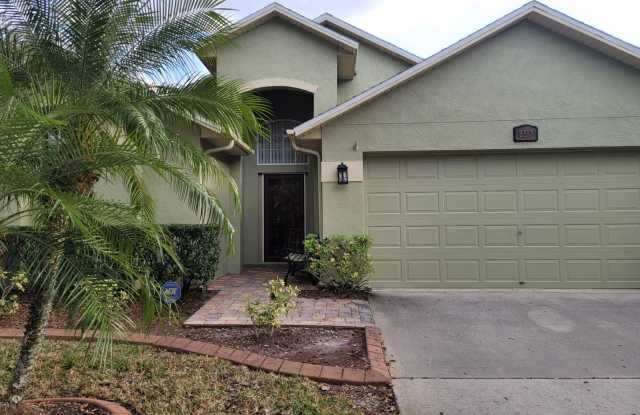 Envision you and your family enjoying living in this stunning 3 BR, 2 BA, 2-car garage home on a quiet corner lot in the West Meadows community in New Tampa, north of Downtown Tampa! photos photos