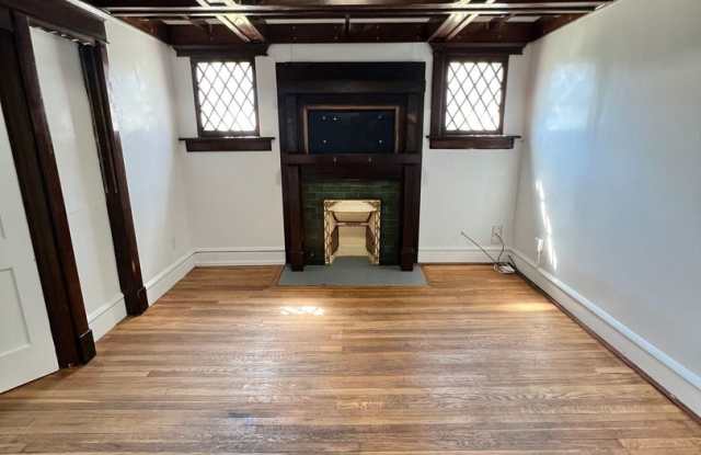 Stylish 2-Bedroom Unit Featuring Decorative Fireplace Gallery 4