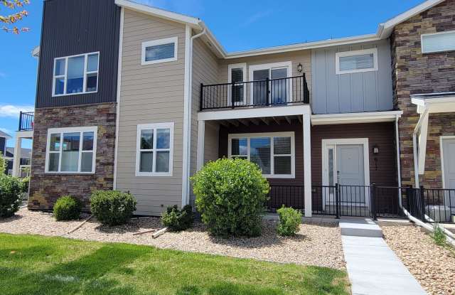 Spacious 3 level, 4 bedroom townhome with attached 2 car garage at Silver Meadows Townhomes on Longmont. photos photos