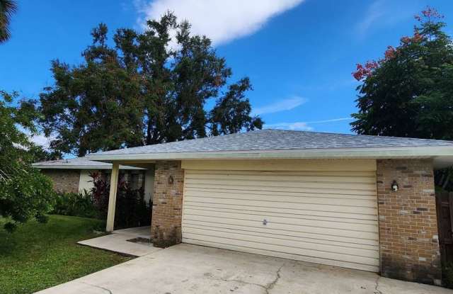 Spacious 4-Bedroom Retreat in Palm Bay – Multiple Living Areas & Endless Comfort! photos photos
