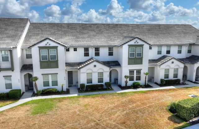 Resort-Style Living Near Champions Gate! Stunning 4-Bed, 4.5-Bath Townhome with Private Pool! - 430 Captiva Drive, Four Corners, FL 33896