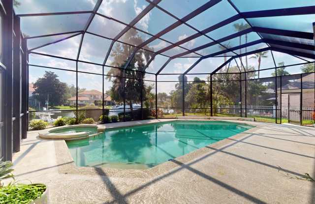 Discover this stunning waterfront rental in the prestigious Queens Harbor Yacht and Country Club photos photos