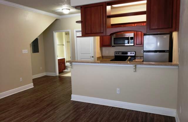 3 bedroom/ 3 bath town home for rent in Univerity Green's gated community with a pool and renting for $1475 per month photos photos