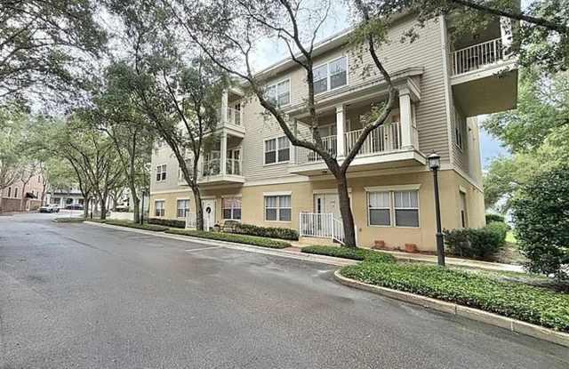 2/2 2nd floor unit in Haile Plantation Village Center Gallery 1