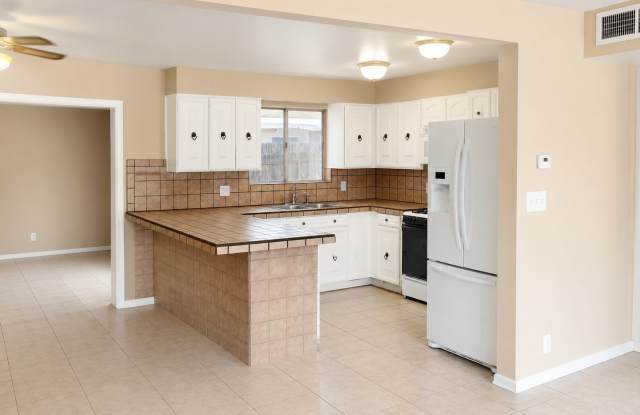 OPEN House COMING  -   LARGE 4BR/2BA HOUSE  – NEWLY REMODELED BATHROOMS – TILE THROUGHOUT – $1,995 -  REMODELED, NEW BATHROOMS WITH NEW TUB AND SHOWERS, GREAT LOCATION, NEAR MCC, SHOPPING ETC. Gallery 4
