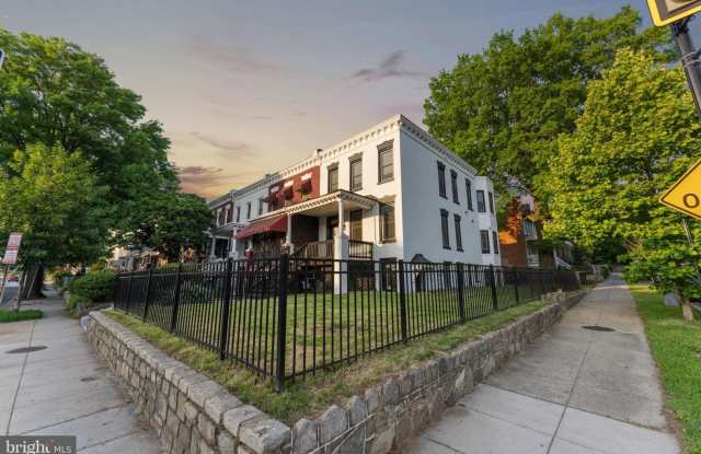 This spacious, open floor plan, end unit town home features modern finishes. - 2401 North Capitol Street Northeast, Washington, DC 20002