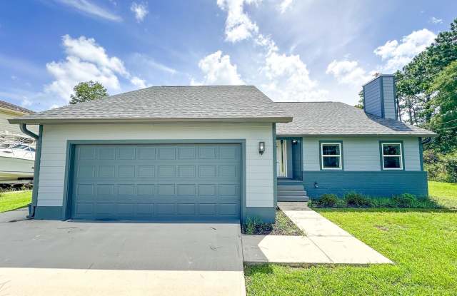 Stunning Waterfront Home w/ Mother-In-Law Suite on Perdido Bay For Rent! Lawn care included! photos photos