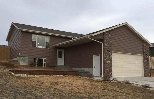 Spacious 4-Bed, 3-Bath Family Home with Fenced Yard and Attached Garage photos photos