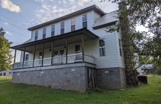 Welcome to this charming 3-bedroom, 1-bathroom home located in the scenic New Blaine, AR. photos photos