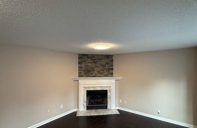 Spacious 3-Bedroom Townhome with Fireplace & Private Fenced Backyard Gallery 3