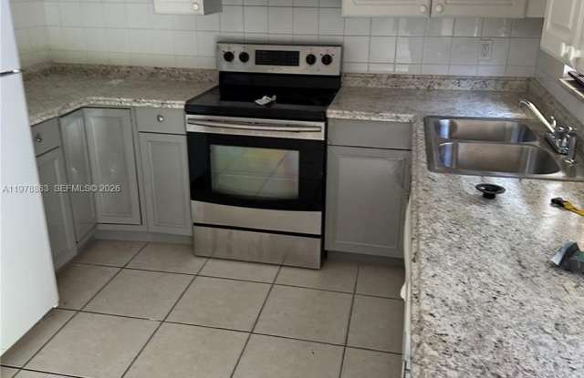 5223 NW 27th St photos photos